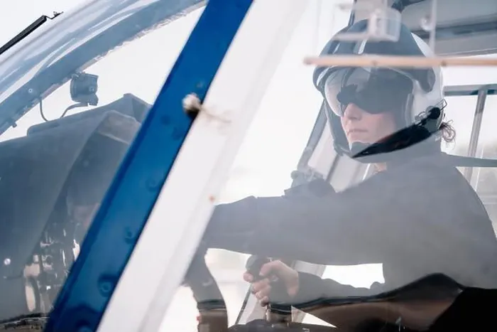 Framed Print : Pilot Woman inside a helicopter Framed Print : Pilot Woman inside a helicopter
