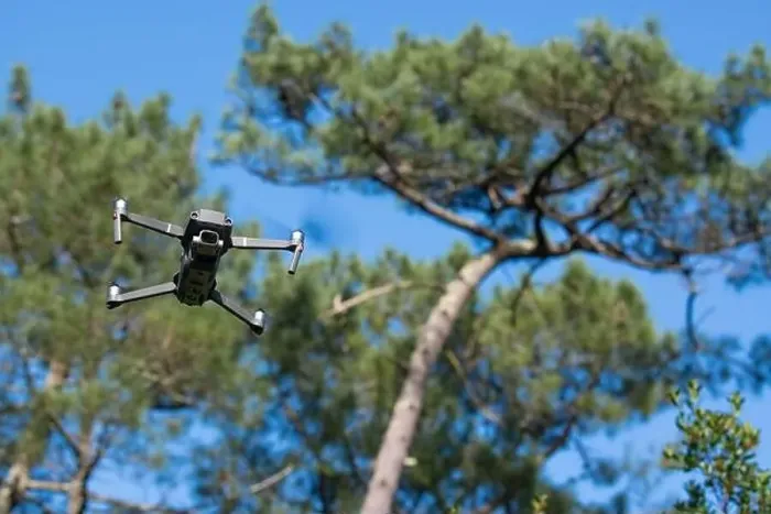 Framed Print : Piloting drone in the forest in the morning with clear blue sky Framed Print : Piloting drone in the forest in the morning with clear blue sky