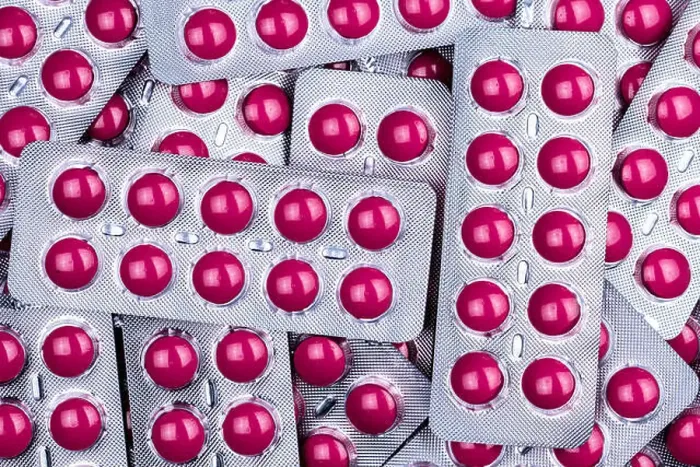 Framed Print : Pink tablets pill in blister pack Framed Print : Pink tablets pill in blister pack