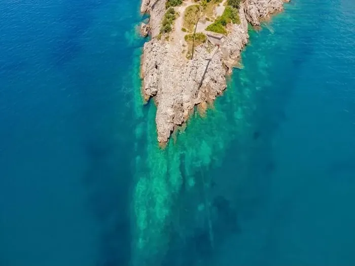 Framed Print : The pipe drains the sewer into the sea. Environmental pollution. Drone view Framed Print : The pipe drains the sewer into the sea. Environmental pollution. Drone view