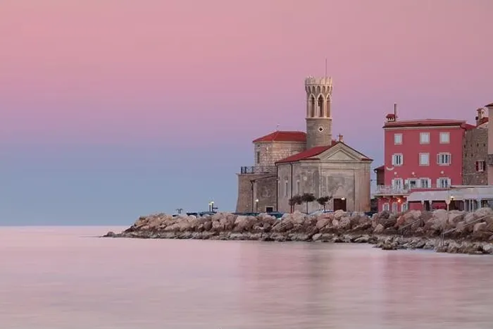 Framed Print : Piran, Slovenia. Cityscape image of Piran, Slovenia with historical church and lighthouse at sunrise Framed Print : Piran, Slovenia. Cityscape image of Piran, Slovenia with historical church and lighthouse at sunrise