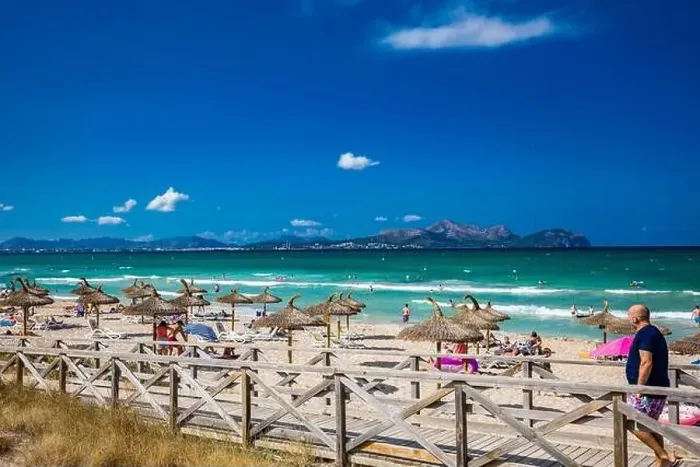 Framed Print : PLAYA DE MURO, Mallorca, Spain - 23 July 2020 - People enjoying hot summer day on popular sandy city beach in Mallorca Framed Print : PLAYA DE MURO, Mallorca, Spain - 23 July 2020 - People enjoying hot summer day on popular sandy city beach in Mallorca