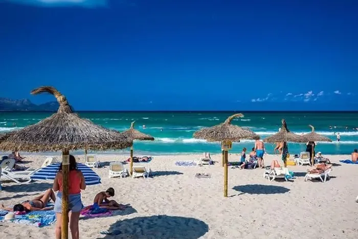 Framed Print : PLAYA DE MURO, Mallorca, Spain - 23 July 2020 - People enjoying hot summer day on popular sandy city beach in Mallorca Framed Print : PLAYA DE MURO, Mallorca, Spain - 23 July 2020 - People enjoying hot summer day on popular sandy city beach in Mallorca