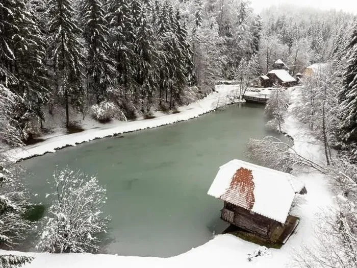 Framed Print : Pond with snowy forest and small cabin. Winter season Framed Print : Pond with snowy forest and small cabin. Winter season