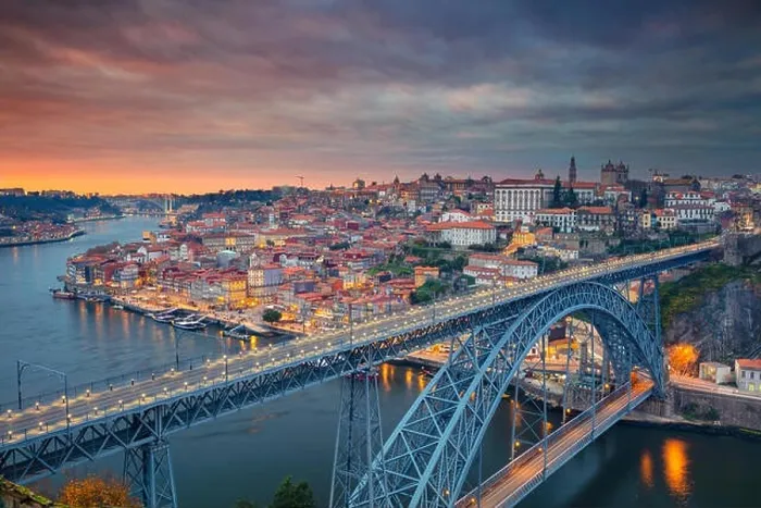 Framed Print : Porto, Portugal. Aerial cityscape image of Porto, Portugal with the famous Luis I Bridge and the Douro River during dramatic sunset Framed Print : Porto, Portugal. Aerial cityscape image of Porto, Portugal with the famous Luis I Bridge and the Douro River during dramatic sunset