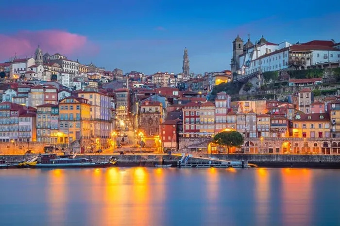Framed Print : Porto, Portugal. Cityscape image of Porto, Portugal with reflection of the city in the Douro River during sunrise Framed Print : Porto, Portugal. Cityscape image of Porto, Portugal with reflection of the city in the Douro River during sunrise