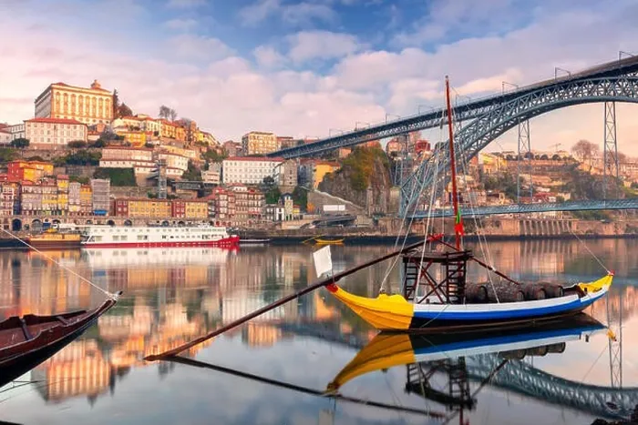 Framed Print : Porto, Portugal. Cityscape image of Porto, Portugal with reflection of the city in the Douro River during sunrise Framed Print : Porto, Portugal. Cityscape image of Porto, Portugal with reflection of the city in the Douro River during sunrise