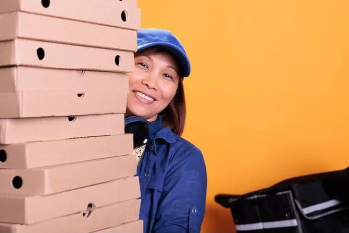 Framed Print : Portrait of asian elderly delivery worker holding pizza boxes Framed Print : Portrait of asian elderly delivery worker holding pizza boxes