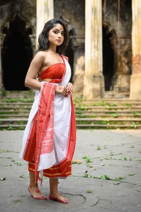 Framed Print : Portrait of beautiful Bengali woman in red and white traditional ethnic saree Framed Print : Portrait of beautiful Bengali woman in red and white traditional ethnic saree