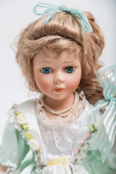 Framed Print : Portrait of a ceramic porcelain handmade vintage doll with long blond hair Framed Print : Portrait of a ceramic porcelain handmade vintage doll with long blond hair
