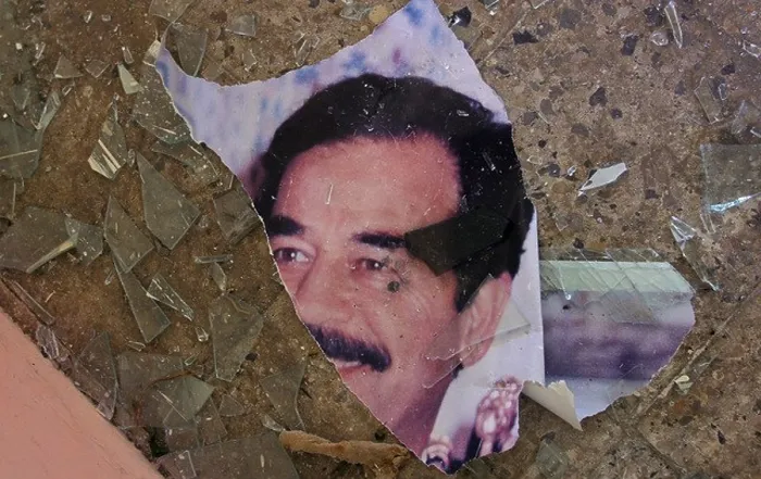 Framed Print : a portrait of deposed iraqi dictator saddam hussein is torn and discarded in a government building on the outskirts of mosul Framed Print : a portrait of deposed iraqi dictator saddam hussein is torn and discarded in a government building on the outskirts of mosul