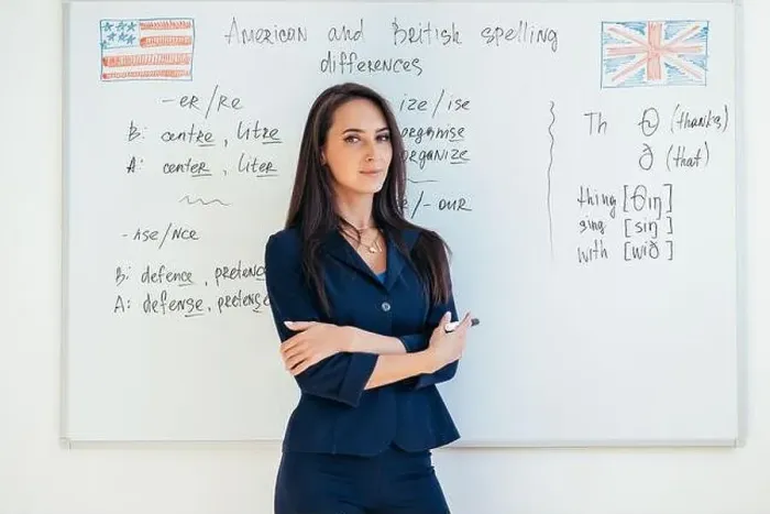 Framed Print : Portrait of female english teacher in front of whiteboard Framed Print : Portrait of female english teacher in front of whiteboard
