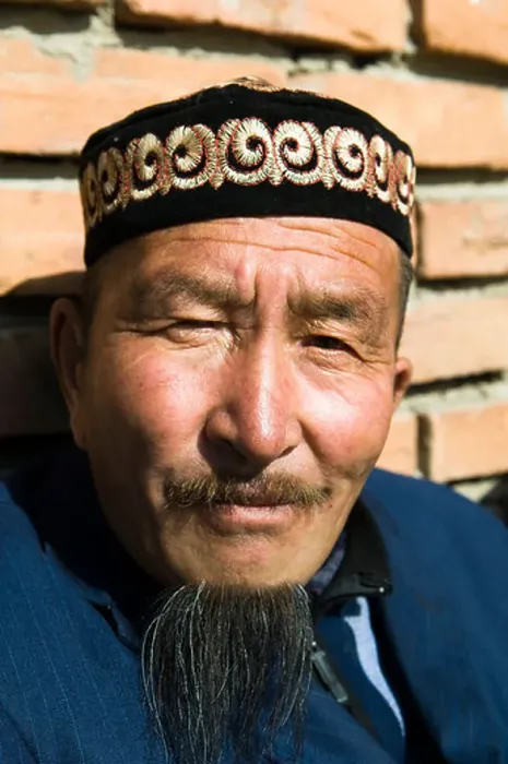 Framed Print : Portrait of a Kazakh man wearing a traditional Kazakh hat Framed Print : Portrait of a Kazakh man wearing a traditional Kazakh hat