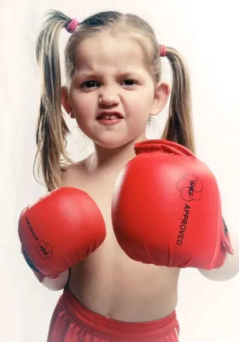 Framed Print : portrait of a little girl boxing gloves Framed Print : portrait of a little girl boxing gloves