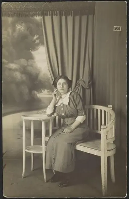 Framed Print : Portrait of a woman in a buttoned skirt and blouse Framed Print : Portrait of a woman in a buttoned skirt and blouse