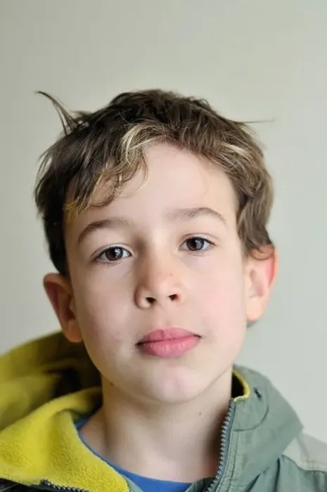 Framed Print : Portrait of a nine year old boy looking straight in the camera Framed Print : Portrait of a nine year old boy looking straight in the camera