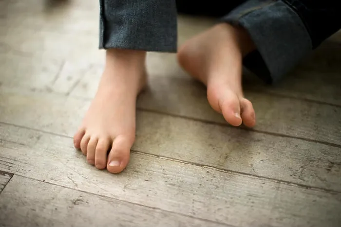 Framed Print : Portrait of young boy's feet Framed Print : Portrait of young boy's feet