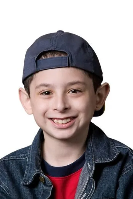 Framed Print : Portrait of a young Caucasian boy wearing a backwards facing baseball cap on a white background Framed Print : Portrait of a young Caucasian boy wearing a backwards facing baseball cap on a white background