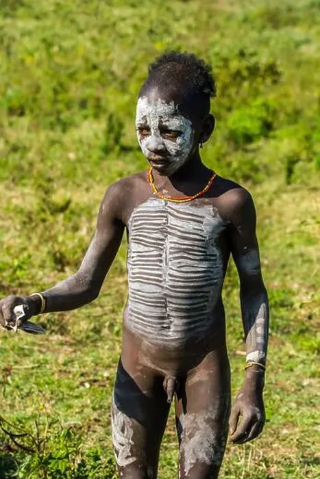 Framed Print : Portrait of young Hamer tribe boy with necklaces and impressive body painting, Omo Valley, Southern Ethiopia Framed Print : Portrait of young Hamer tribe boy with necklaces and impressive body painting, Omo Valley, Southern Ethiopia