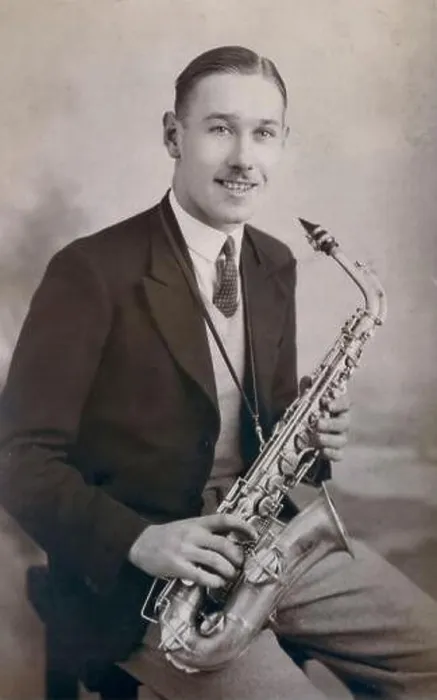 Framed Print : A portrait of a young man with his Alto Saxophone by the Los Angeles Portrait Studios Framed Print : A portrait of a young man with his Alto Saxophone by the Los Angeles Portrait Studios