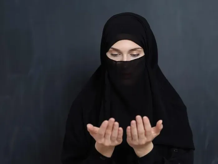Framed Print : Portrait of young Muslim woman with niqab making dua Framed Print : Portrait of young Muslim woman with niqab making dua