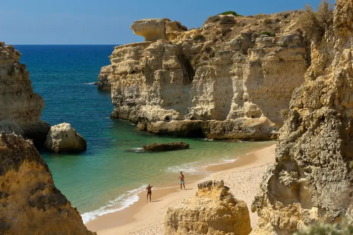 Framed Print : Portugal, the Algarve, Praia de São Rafael, near Albufeira with one couple playing beach tennis Framed Print : Portugal, the Algarve, Praia de São Rafael, near Albufeira with one couple playing beach tennis