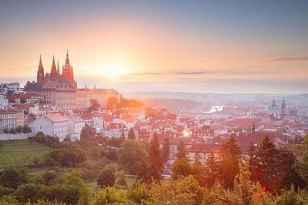 Prague, Czech Republic. Cityscape image of Prague, capital city of Czech Republic with St. Vitus Cathedral during summer sunrise