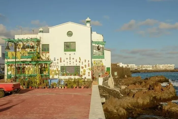 Framed Print : Punta Mujeres, Spain - 18 January 2021: the village of Punta Mujeres on Lanzarote island in Spain Framed Print : Punta Mujeres, Spain - 18 January 2021: the village of Punta Mujeres on Lanzarote island in Spain