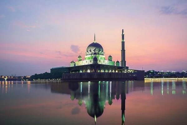 Putrajaya mosque between sunsire in Kuala Lumpur, Malaysia. Pink mosque in Kuala Lumpur, Malaysia. Asia