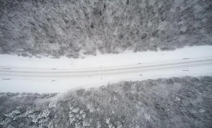 Framed Print : Railroad in winter season aerial above top drone view Framed Print : Railroad in winter season aerial above top drone view