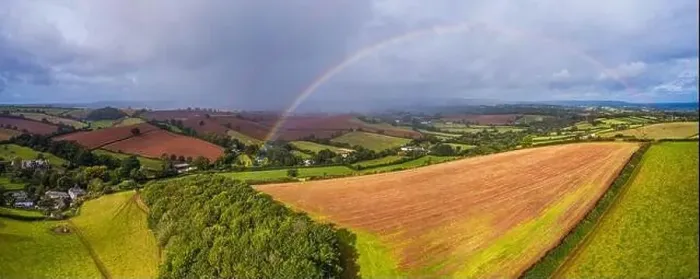 Framed Print : Rainbow over the Fields over Compton Castle from a drone, Compton, Devon, England, Europe Framed Print : Rainbow over the Fields over Compton Castle from a drone, Compton, Devon, England, Europe