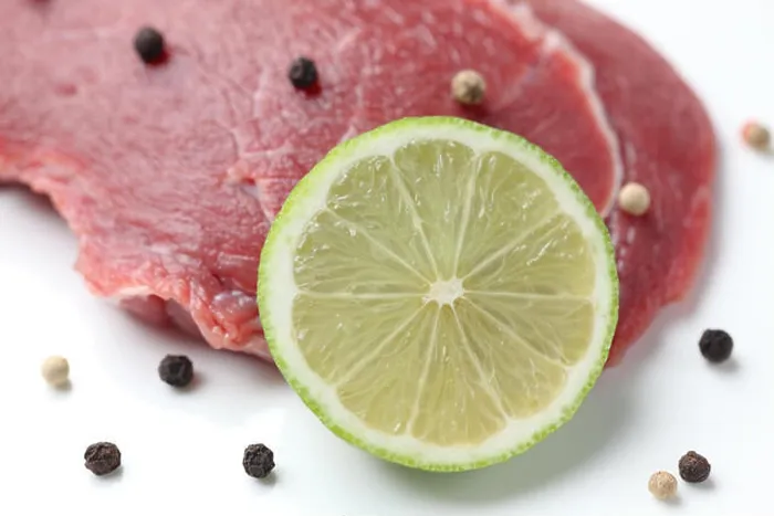 Framed Print : Raw beef with peppercorns and lime Framed Print : Raw beef with peppercorns and lime