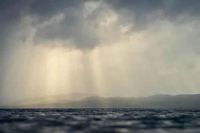Framed Print : rays through clouds over the water Framed Print : rays through clouds over the water