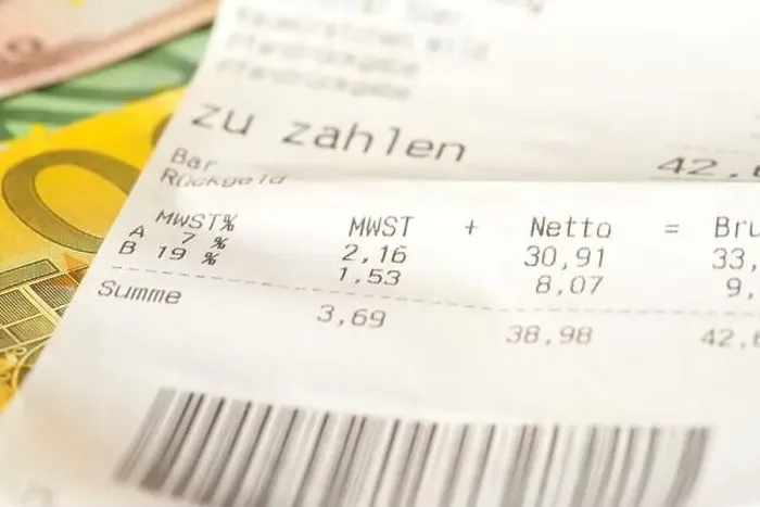 Framed Print : A receipt and euro bills Framed Print : A receipt and euro bills