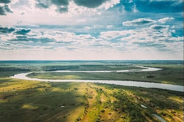 Rechytsa, Gomel Region, Belarus. Aerial View Of Dnieper River. Sunny Sky Above Green Meadow And River Landscape. Top View Of European Nature From High