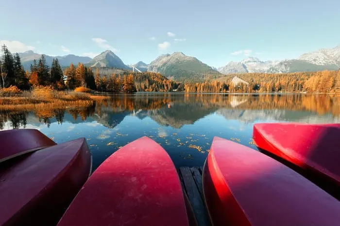 Framed Print : Red boats on Strbske Pleso lake. Location: High Tatras National Park, Slovakia Framed Print : Red boats on Strbske Pleso lake. Location: High Tatras National Park, Slovakia