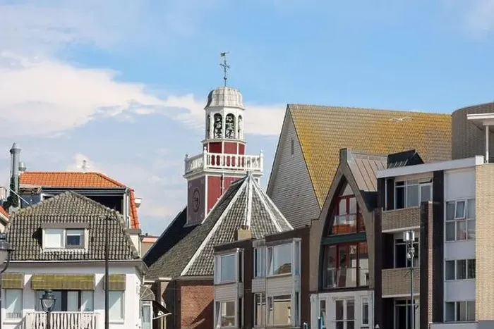 Framed Print : Red church on the coastal centrum of Noordwijk in the Netherlands Framed Print : Red church on the coastal centrum of Noordwijk in the Netherlands