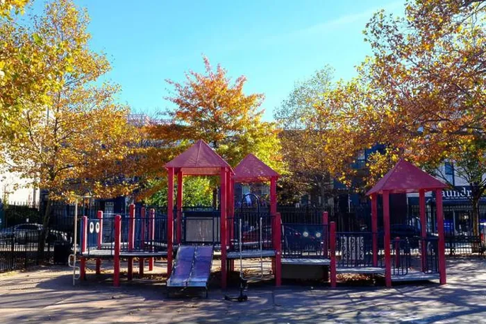 Framed Print : Red Kids Playground In Fall with Small Slide Framed Print : Red Kids Playground In Fall with Small Slide