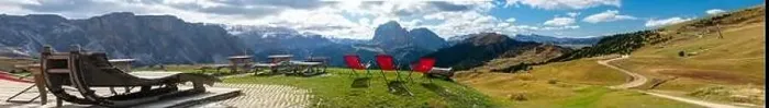 Framed Print : Red lawn chairs with dramtic Mountain background. Dolomites in European Alps. Gardena Pass, Italy. Vacation Theme Framed Print : Red lawn chairs with dramtic Mountain background. Dolomites in European Alps. Gardena Pass, Italy. Vacation Theme