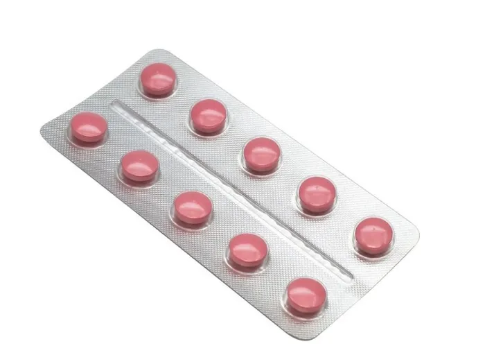 Framed Print : Red painkillers pills on white background Framed Print : Red painkillers pills on white background