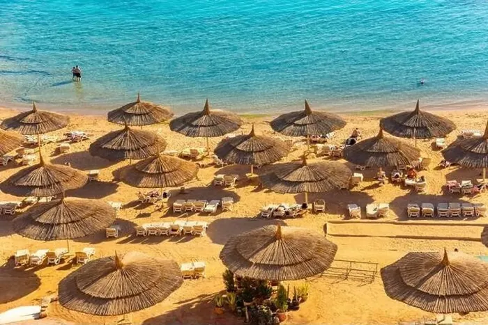 Framed Print : Red sea beach from aerial top view. Tourists relaxing under umbrellas on luxury resort, Egypt Framed Print : Red sea beach from aerial top view. Tourists relaxing under umbrellas on luxury resort, Egypt