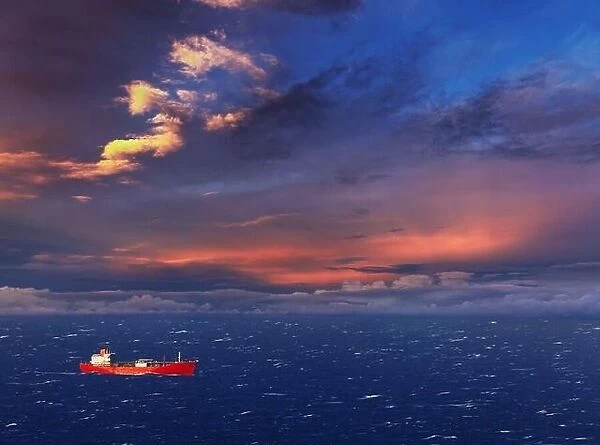 Red ship in the sea at sunset