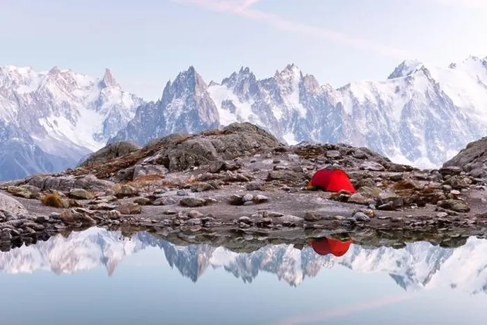 Framed Print : Red tent on Lac Blanc lake coast in France Alps. Monte Bianco mountains range on background. Landscape photography, Chamonix Framed Print : Red tent on Lac Blanc lake coast in France Alps. Monte Bianco mountains range on background. Landscape photography, Chamonix