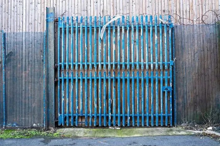 Framed Print : Redundant blue painted metal gate Framed Print : Redundant blue painted metal gate