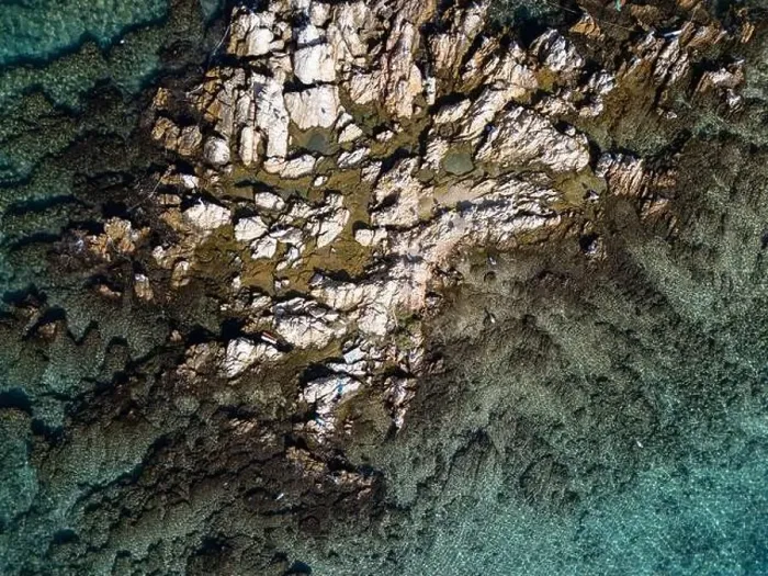 Framed Print : Reefs at the middle of the sea from the top, photo shoot from a drone in a sunny day Framed Print : Reefs at the middle of the sea from the top, photo shoot from a drone in a sunny day
