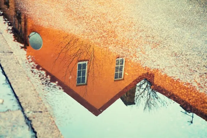 Framed Print : Reflection of a house in a puddle Framed Print : Reflection of a house in a puddle