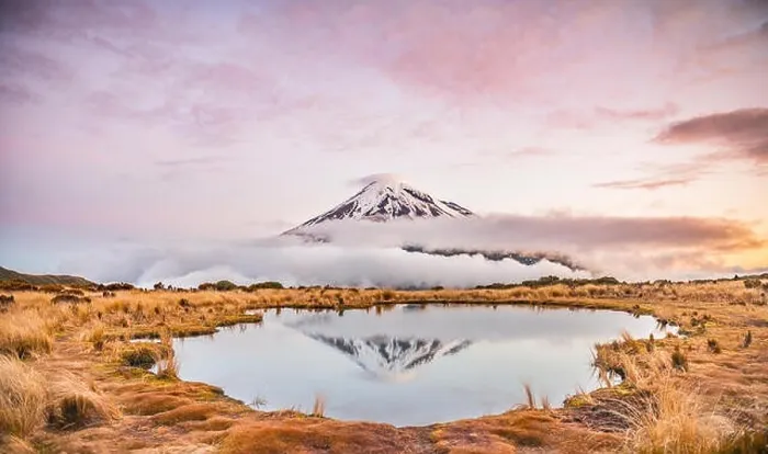 Framed Print : Reflection in Pouakai Tarn, stratovolcano Mount Taranaki or Mount Egmont at sunset Framed Print : Reflection in Pouakai Tarn, stratovolcano Mount Taranaki or Mount Egmont at sunset