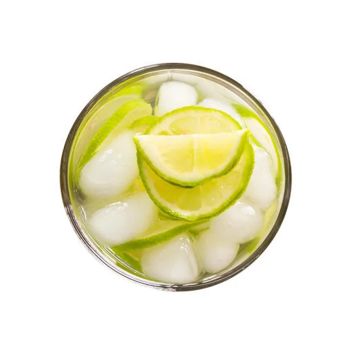 Framed Print : refreshing lemonade with green lemon and ice isolated on white background close-up top view Framed Print : refreshing lemonade with green lemon and ice isolated on white background close-up top view