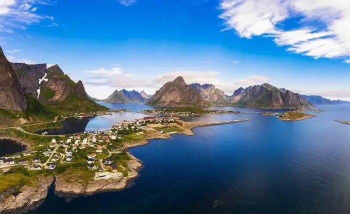 Framed Print : Reine fishing village surrounded by high mountains and fjords on Lofoten islands Framed Print : Reine fishing village surrounded by high mountains and fjords on Lofoten islands