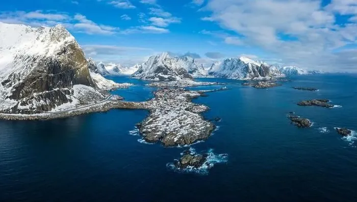 Framed Print : Reine Village and Mountains in Winter. Olstinden Peak. Moskenes, Lofoten Islands. Landscape of Norway. Aerial View Framed Print : Reine Village and Mountains in Winter. Olstinden Peak. Moskenes, Lofoten Islands. Landscape of Norway. Aerial View